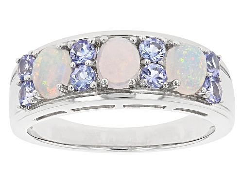 Photo of .54ctw Oval Ethiopian Opal With .41ctw Round Tanzanite Rhodium Over Sterling Silver Band Ring - Size 7