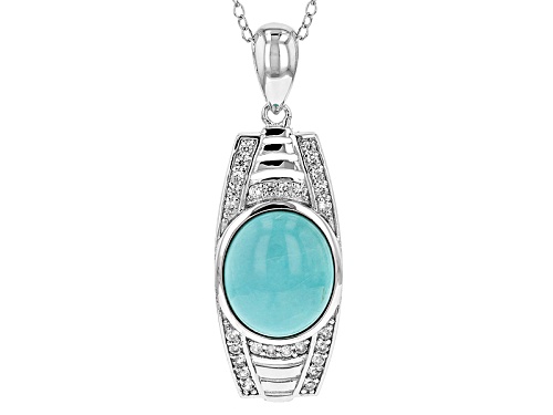 Photo of Pre-Owned 12x10mm Oval Sleeping Beauty Turquoise And .34ctw Round White Zircon Silver Pendant With C