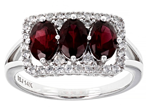 Photo of Pre-Owned 1.43ctw Oval Anthill Garnet With .30ctw Round White Zircon Rhodium Over 14k White Gold Rin - Size 8