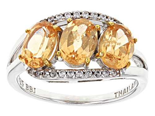 Photo of Pre-Owned 2.32ctw Oval Imperial Hessonite™ With .13ctw Round White Zircon Sterling Silver 3-Stone Ri - Size 8