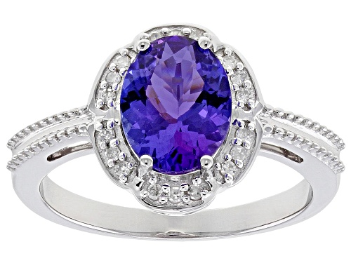 Pre-Owned 1.50ctw Oval Tanzanite And 0.09ctw White Diamond Accent Rhodium Over 10K White Gold Ring - Size 6