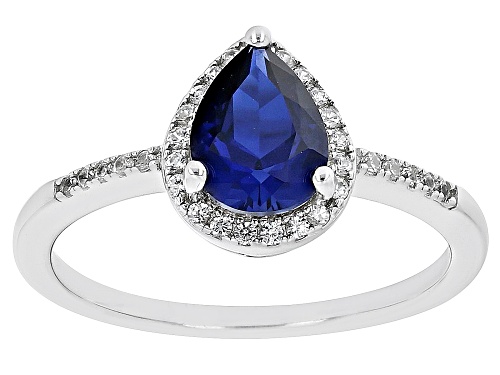 Pre-Owned 1.15ct Pear Shape Lab Created Blue Sapphire With 0.26ctw White Zircon Rhodium Over Silver - Size 9