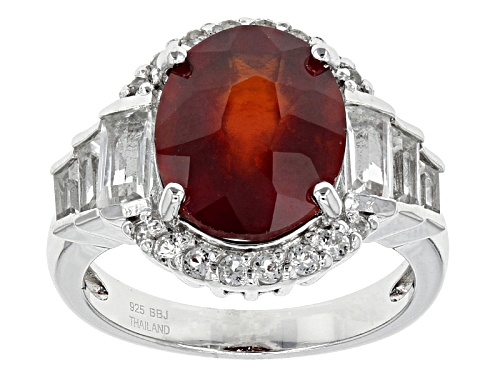 Pre-Owned 3.78ct Oval Hessonite Garnet And 1.08ctw Round And Baguette White Topaz Sterling Silver Ri - Size 8