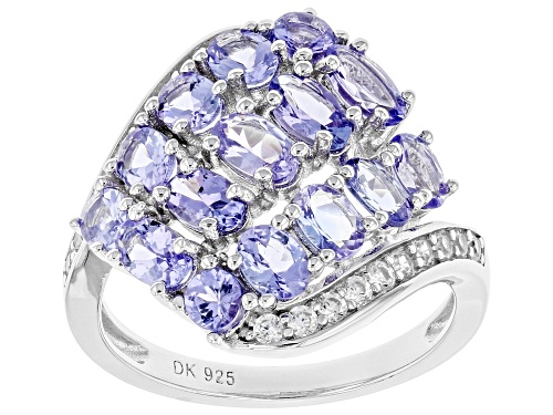 Photo of Pre-Owned 2.30ctw Oval And Round Tanzanite With .26ctw Zircon Rhodium Over Silver Cluster Ring - Size 8