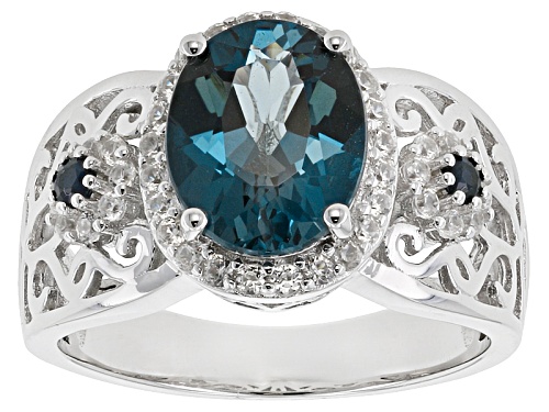 Photo of 2.76ct Oval London Blue Topaz, .09ctw Blue Sapphire, And .34ctw White Zircon Sterling Silver Ring - Size 9