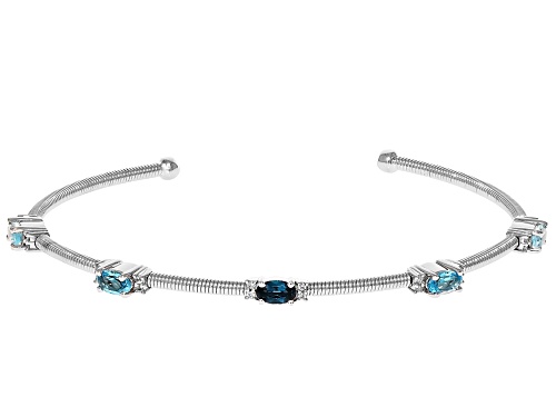 1.22ctw Glacier, London, & Swiss Blue Topaz with 0.11ctw White Zircon Rhodium Over Silver Bracelet - Size 8
