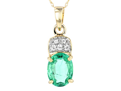 Photo of 1.30Ctw Oval Ethiopian Emerald and .06ctw Round White Zircon 10k Yellow Gold Pendant With Chain.
