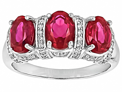 2.95ct Oval Lab Created Ruby With .042ctw Round White Zircon Rhodium Over Silver Ring - Size 6