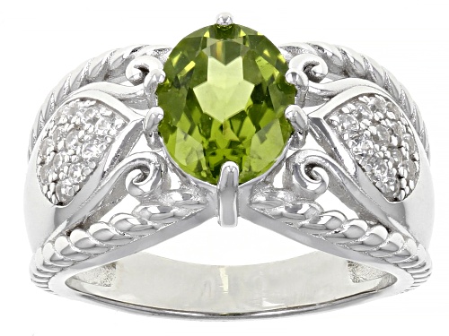 Photo of 1.64ctw Oval Manchurian Peridot(TM) With 0.39ctw Round White Zircon Rhodium Over Silver Ring - Size 8