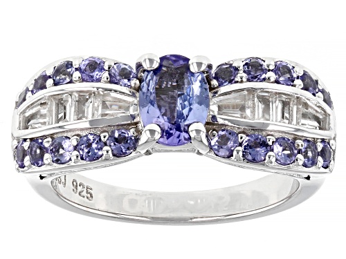 0.57ct Oval And 0.68ctw Round Tanzanite With 0.55ctw Baguette White Topaz Rhodium Over Silver Ring - Size 9