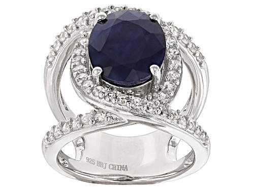 Photo of 3.40ct Oval Blue Sapphire With .86ctw Round White Zircon Rhodium Over Sterling Silver Ring - Size 9