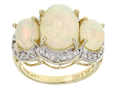 3.58ctw Oval Cabochon Ethiopian Opal And .19ctw White Zircon 10k Yellow Gold 3-Stone Ring - Size 8