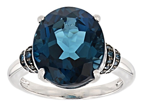 8.16CT OVAL LONDON BLUE TOPAZ WITH .10CTW ROUND BLUE DIAMOND RHODIUM OVER STERLING SILVER RING - Size 9