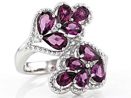 2.88ctw Pear Shape Raspberry Color Rhodolite & .05ctw White Zircon Rhodium Over Silver Bypass Ring - Size 7
