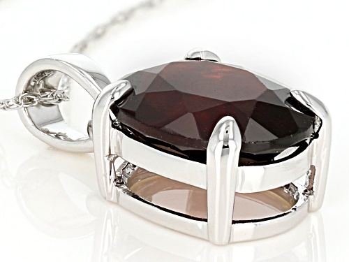 3.65ct oval red hessonite garnet Rhodium Over 10k white gold solitaire pendant with chain.
