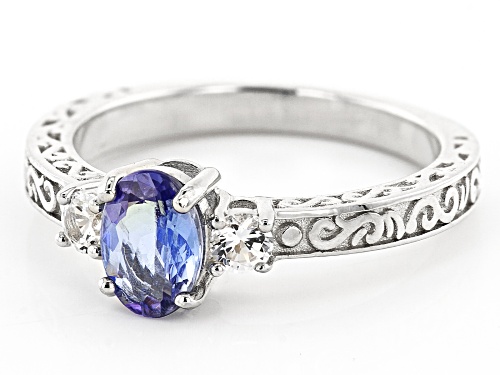 0.28ctw Oval tanzanite with 0.75ct round lab Created sapphire rhodium over sterling silver ring - Size 10