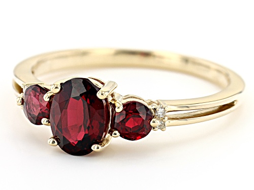 0.75ct Oval And 0.36ctw Round Red Spinel and 0.01ctw White Diamond Accent 10K Yellow Gold Ring - Size 8