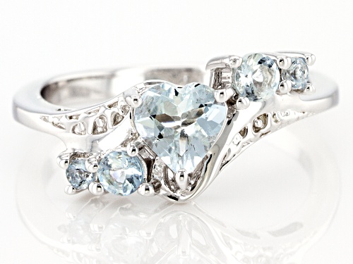 0.60ct Heart Shaped Aquamarine With 0.27ctw Round Aquamarine Rhodium Over Sterling Silver Ring. - Size 8