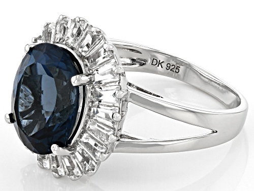 3.91ct Oval London Blue Topaz and .85ctw Tapered Baguette Topaz Rhodium Over Silver Ring - Size 7