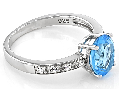 1.96ct Oval Swiss Blue Topaz and .20ctw Round White Zircon Rhodium Over Sterling Silver Ring - Size 9
