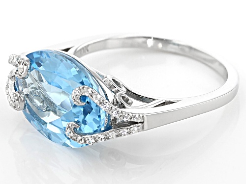 6.38ct Oval Glacier Topaz(TM) and 0.12ctw Zircon Rhodium Over Sterling Silver Ring - Size 8