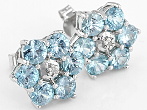 3.93ctw round blue zircon with .01ctw round white 2 diamond accent rhodium over silver earrings