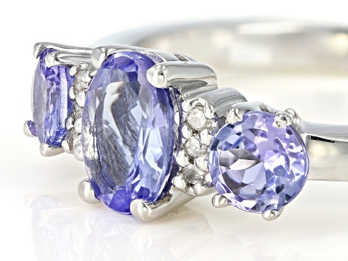 1.08ctw oval and round tanzanite with .03ctw white diamond accent rhodium over sterling silver ring - Size 9