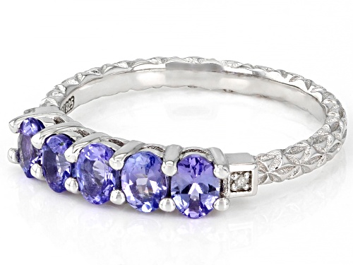 0.81ctw Oval Tanzanite and 0.01ctw Round Diamond Accent Rhodium Over Sterling Silver Band Ring - Size 10