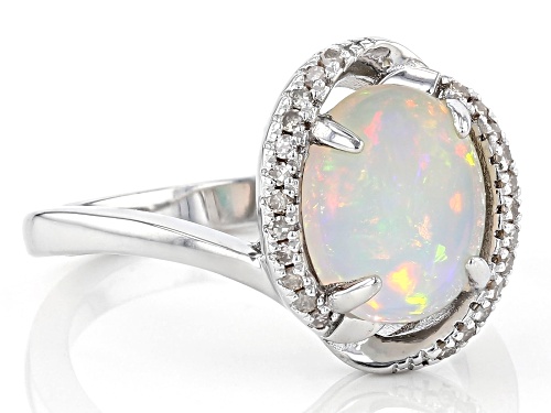 1.50ct Oval Ethiopian Opal and 0.11ctw Champagne Diamond Accent Rhodium Over Silver Ring - Size 9