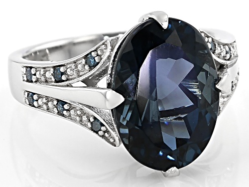 6.38ct Oval London Blue Topaz With 0.08ctw Blue Diamond Accent Rhodium Over Sterling Silver Ring - Size 9