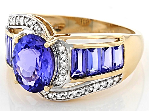 2.62ctw Oval And Baguette Tanzanite With 0.11ctw Round White Diamond 10K Yellow Gold Ring - Size 7