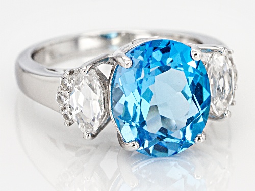 5.61ct Oval Swiss Blue Topaz & 1.03ctw Lab Created White Sapphire Rhodium Over Silver Ring - Size 7