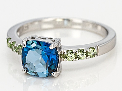 1.42CT SQUARE CUSHION LONDON BLUE TOPAZ WITH .22CTW GREEN SAPPHIRE RHODIUM OVER STERLING SILVER RING - Size 9