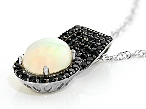 1.50ctw Oval Ethiopian Opal With 0.39ctw Black Spinel Rhodium Over Silver Pendant With Chain