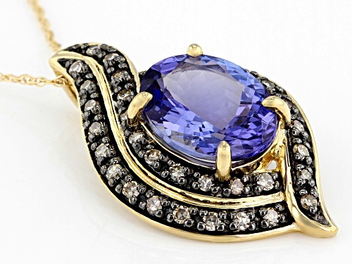 2.35ct Oval Tanzanite With .22ctw Round Champagne Diamond 14k Yellow Gold Pendant With Chain