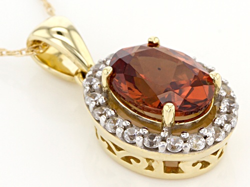 .88ct Oval Malaya Garnet And .13ctw Round White Zircon 14k Yellow Gold Pendant With Chain