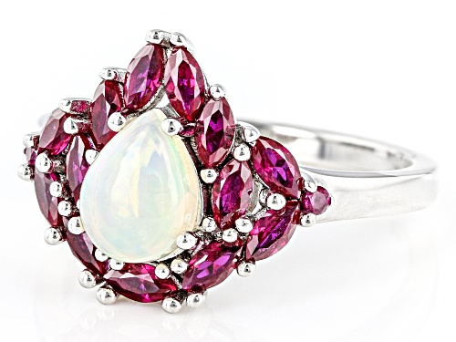 0.63ct Pear Shaped Ethiopian Opal With 1.00ctw Lab Created Ruby Rhodium Over Sterling Silver Ring - Size 8