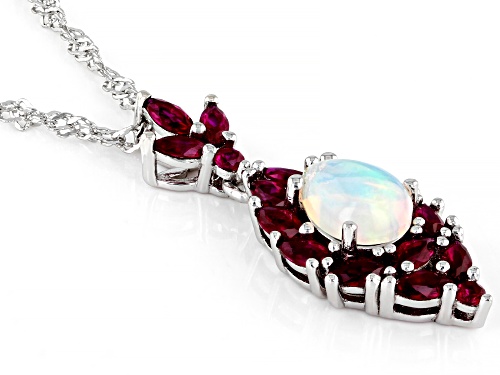 0.63ctw Ethiopian Opal With 1.13ctw Lab Created Ruby Rhodium Over Silver Pendant With Chain