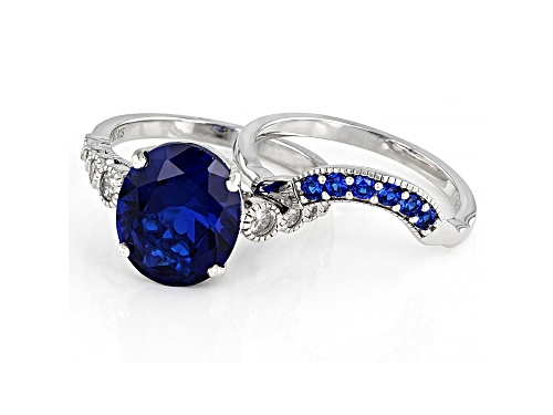 4.03ctw Lab Created Blue Spinel With 0.36ctw White Zircon Rhodium Over Sterling Silver Ring Set - Size 10