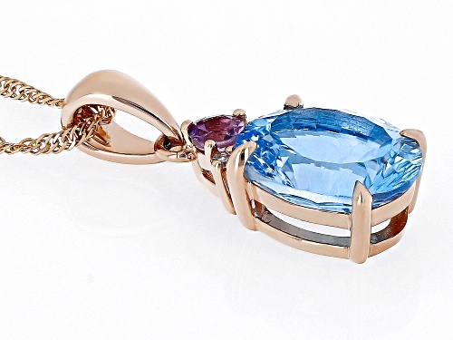 2.81ct Swiss Blue Topaz, 0.13ctw Color Shift Garnet & 0.01ctw Diamond 10k Rose Gold Pendant & Chain