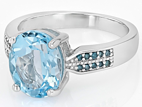 3.25ct Oval Glacier Topaz™ With .09ctw Blue Diamond Accent Rhodium Over Sterling Silver Ring - Size 6