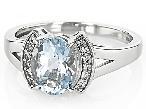 1.31ct Oval Aquamarine With 0.14ctw Round White Zircon Rhodium Over Sterling Silver Ring - Size 7