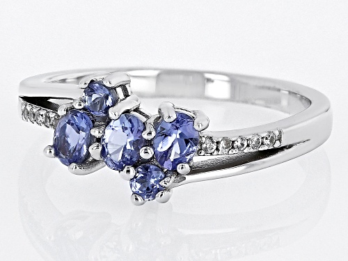 0.43ct Oval And 0.10ctw Round Tanzanite With .03ctw White Zircon Rhodium Over Silver Bypass Ring - Size 7