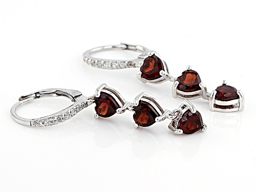 .51ctw Heart Shape Vermelho Garnet™ And .02ctw Round White Topaz Rhodium Over Silver Dangle Earrings
