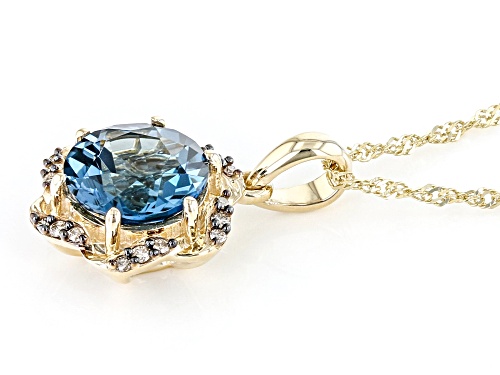 1.99ct London Blue Topaz And 0.08ctw Champagne Diamond 10k Yellow Gold Pendant With Chain