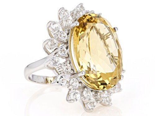 25.00CT OVAL BRAZILIAN CITRINE WITH 3.50CTW ROUND WHITE TOPAZ RHODIUM OVER SILVER RING - Size 7