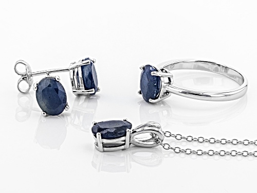 6.00CTW OVAL INDIAN BLUE SAPPHIRE RHODIUM OVER STERLING SILVER RING, PENDANT, CHAIN , EARRINGS SET