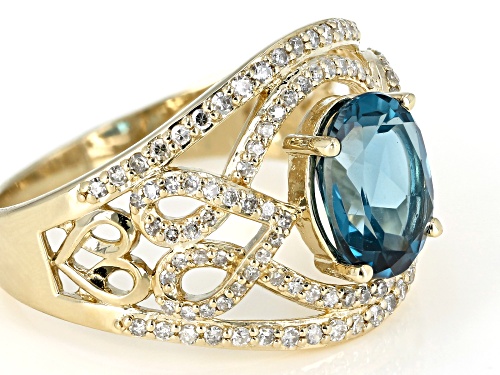 2.00CT OVAL LONDON BLUE TOPAZ WITH .43CTW ROUND WHITE DIAMOND 10K YELLOW GOLD RING - Size 6
