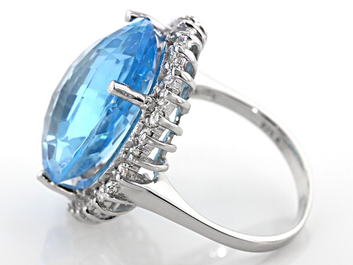 14.13CT OVAL, CHECKERBOARD CUT SKY BLUE TOPAZ WITH .65CTW ROUND WHITE TOPAZ RHODIUM OVER SILVER RING - Size 8