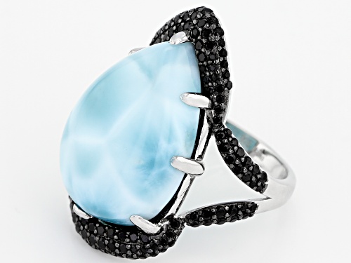 22X16MM PEAR SHAPE CABOCHON LARIMAR WITH .66CTW ROUND BLACK SPINEL RHODIUM OVER SILVER RING - Size 7